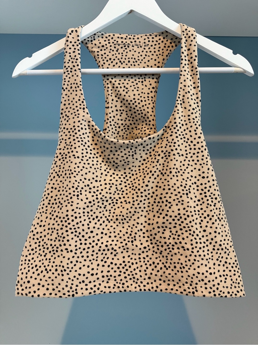 Abercrombie & Fitch longline sports bra. Tan/black polkadot pattern. Sz large.